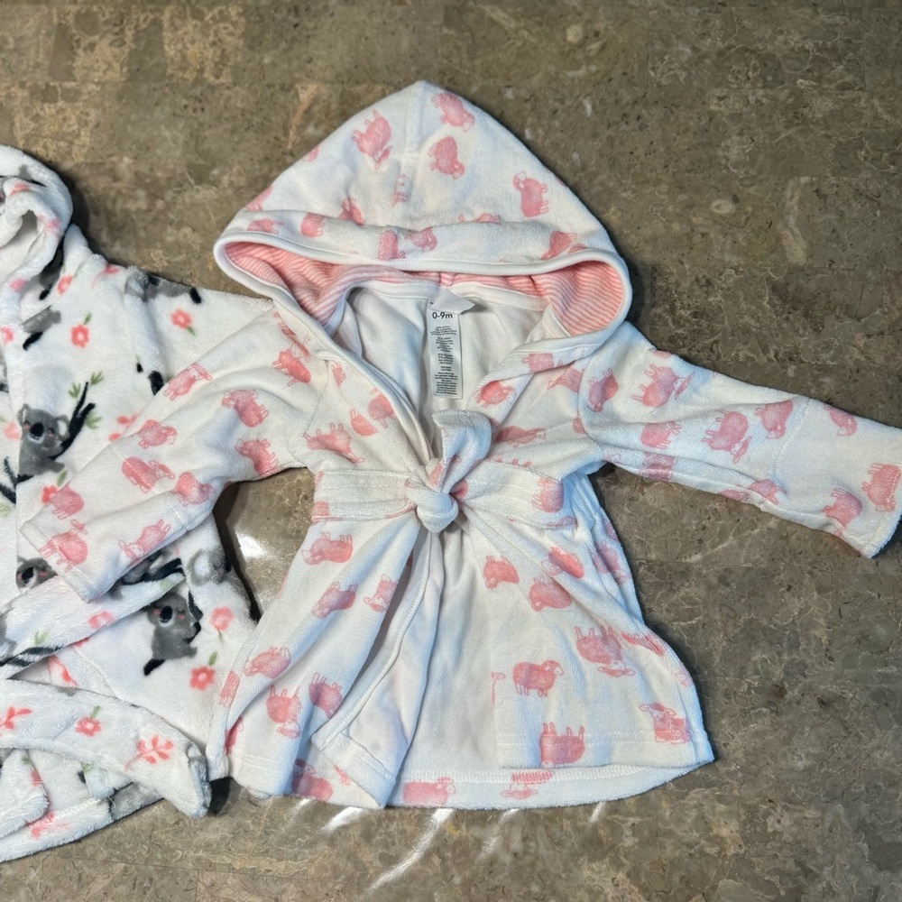 Carter’s Baby girl hooded bath robes size 0-9 months
Like new condition - Picture 5 of 8